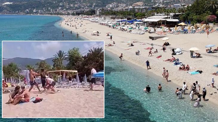 Alanya'da plajda İngiliz turiste şezlong dayağı! Skandal görüntünün bedeli ağır oldu