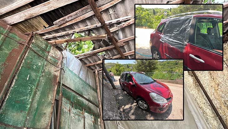 Garaj çatısına çıkan kurbanlık boğa, otomobilin üzerine düştü