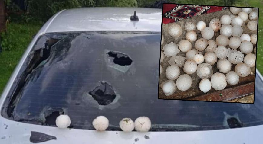 Kar topu büyüklüğünde dolu! Araçların camları kırıldı